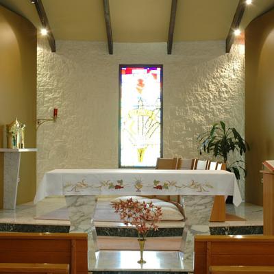 Altar and stained glass window